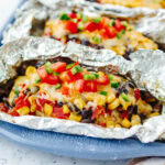 An up close look at chicken foil packets ready to serve.