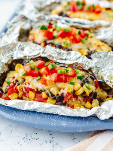 An up close look at chicken foil packets ready to serve.