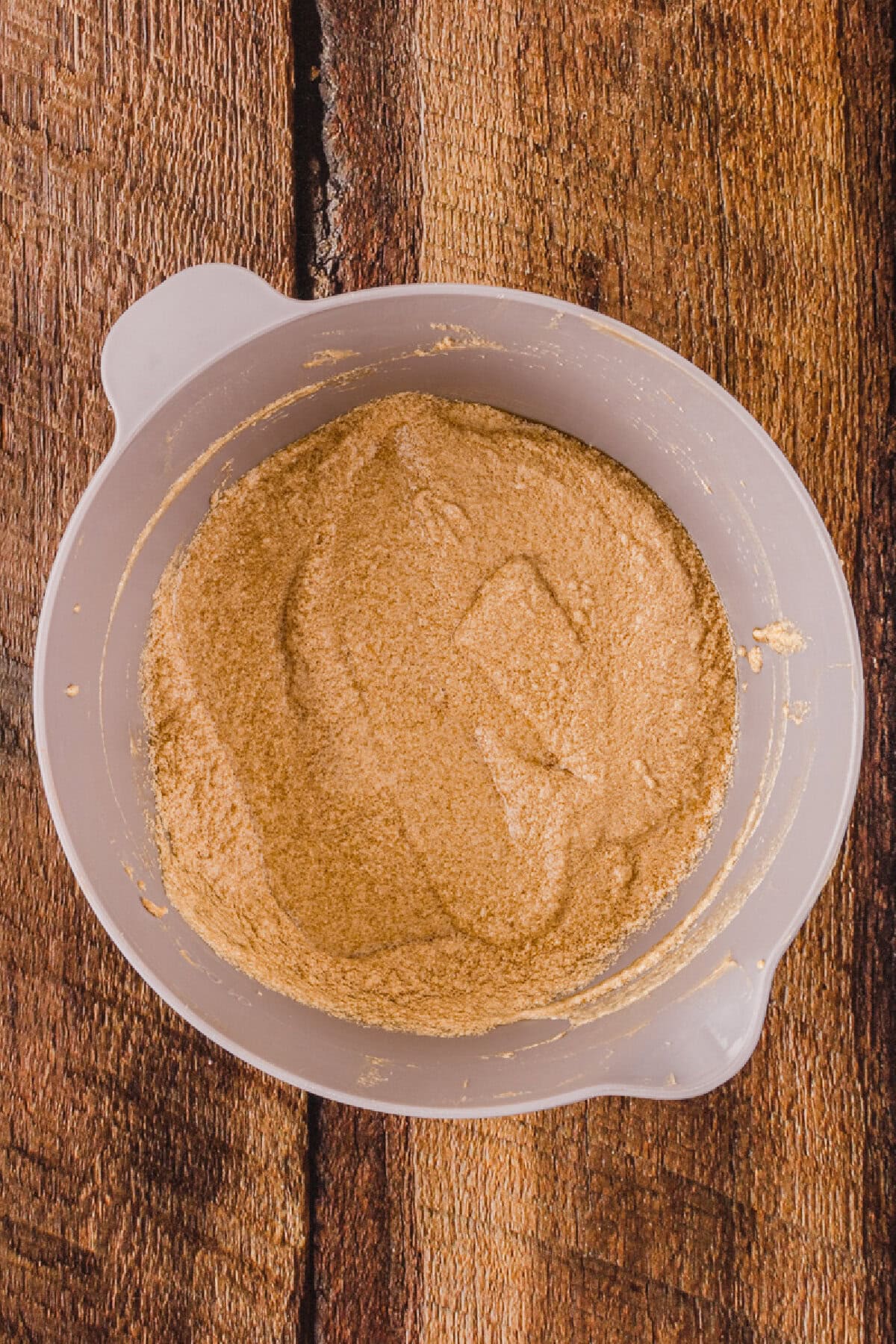 Vanilla extract and egg folded into a creamed butter and sugar mixture.