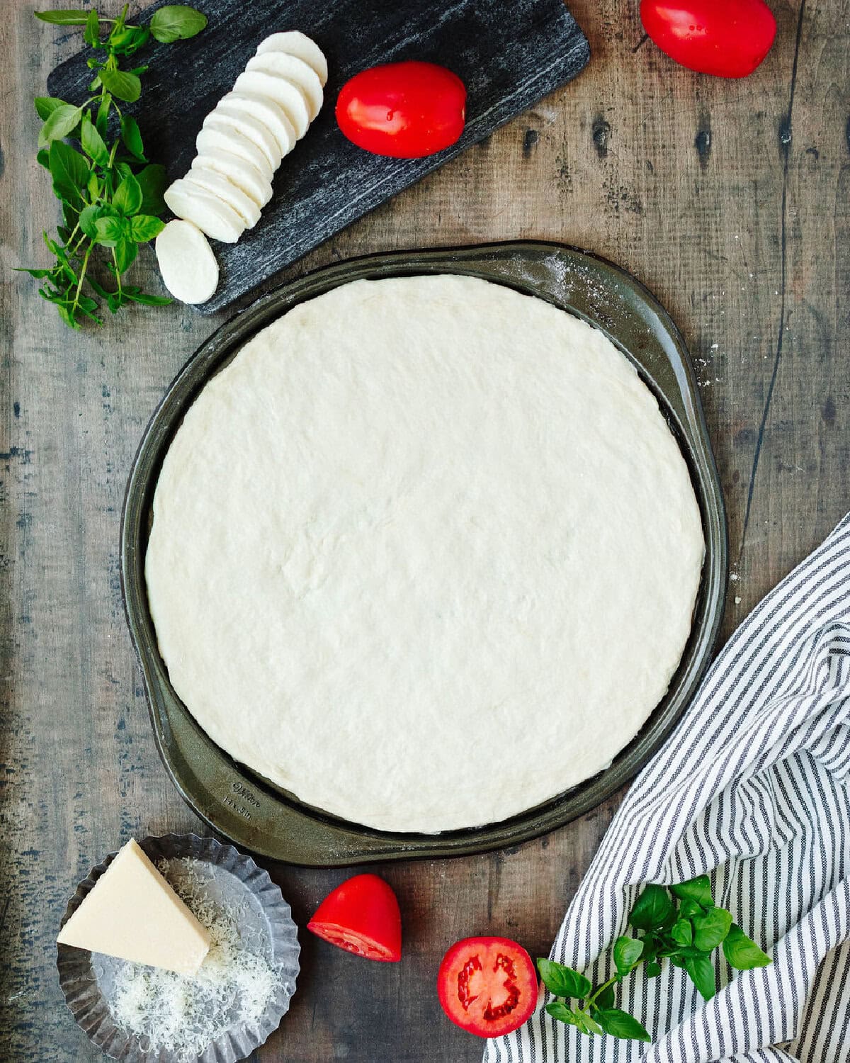 No yeast pizza dough spread to cover a pizza pan.