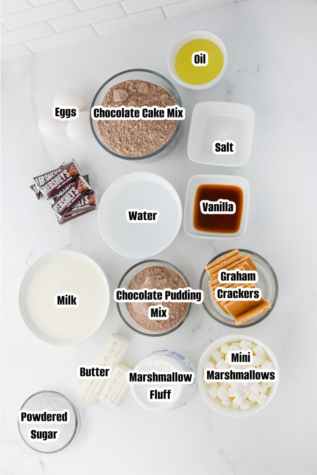 All the ingredients needed to make a S'mores Poke Cake.