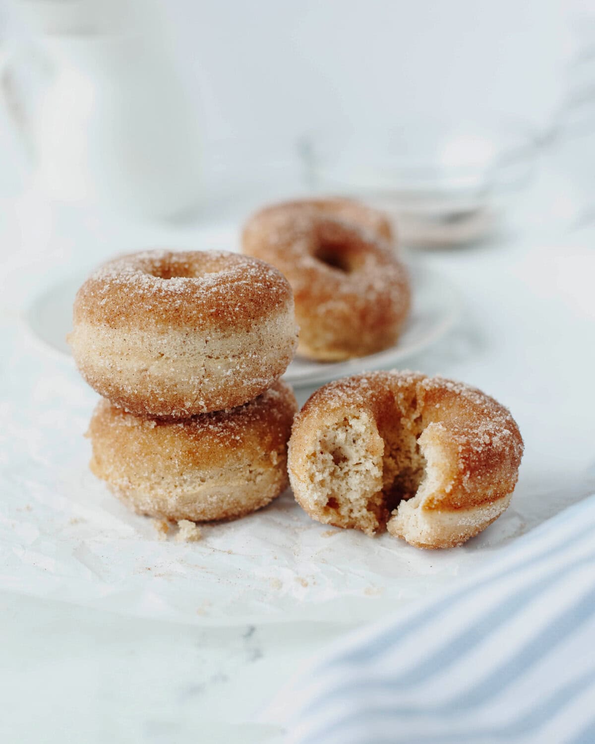 Soft baked cinnamon sugar donut with a fluffy cake-like center.