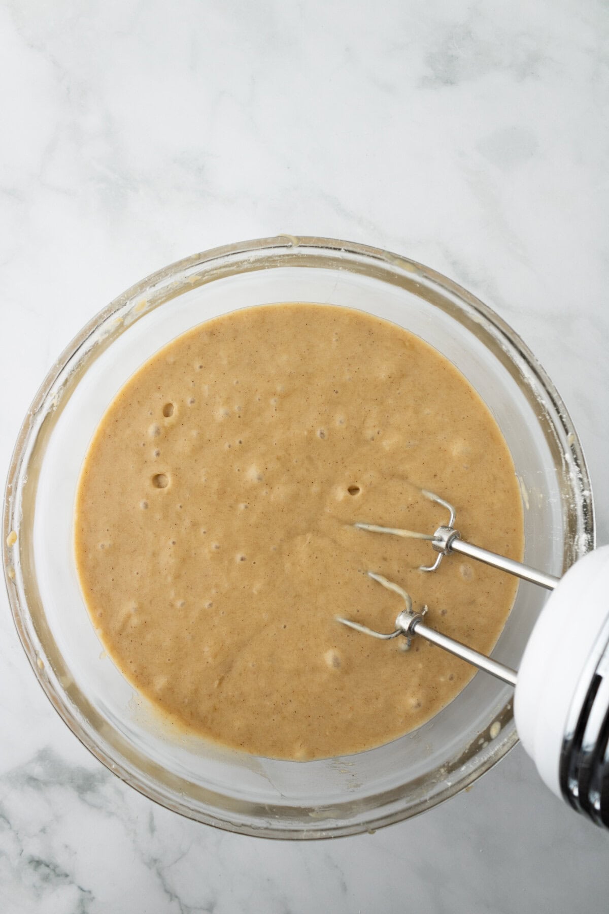 Dry mixture and wet mixture combined using an electric mixer.