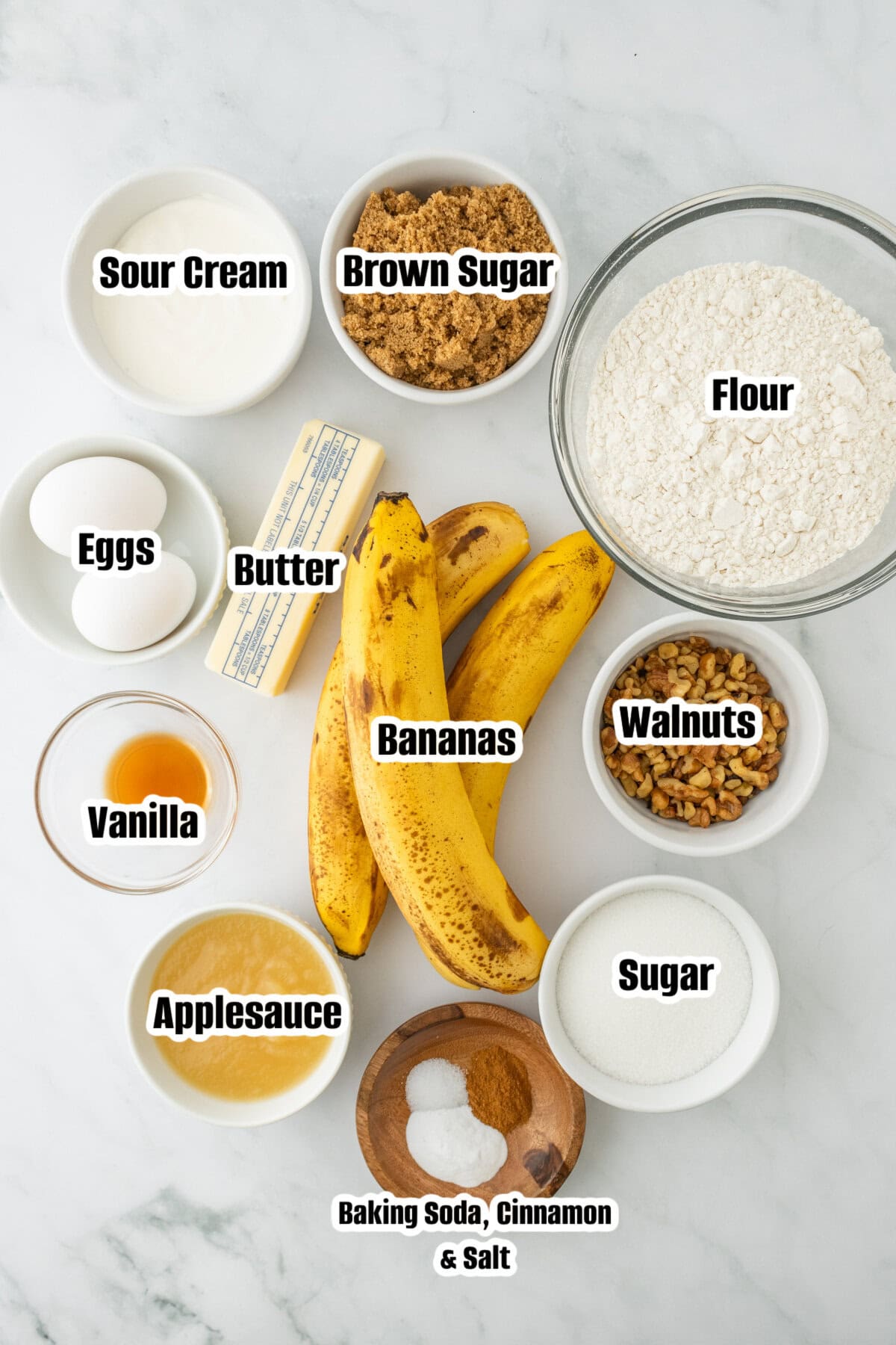 All the ingredients needed to make banana bread bars with cream cheese frosting.