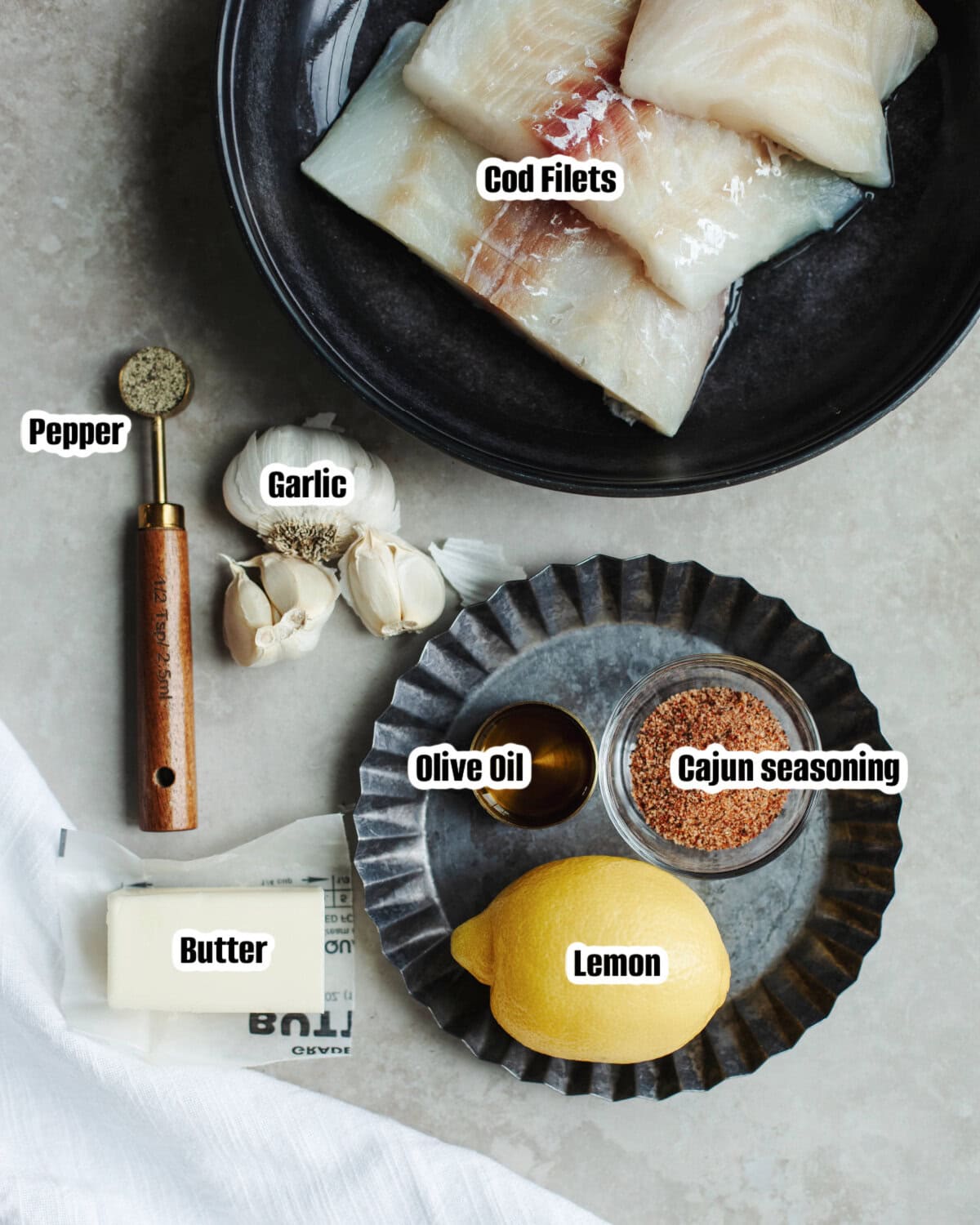All the ingredients needed to make Cajun Baked Cod.