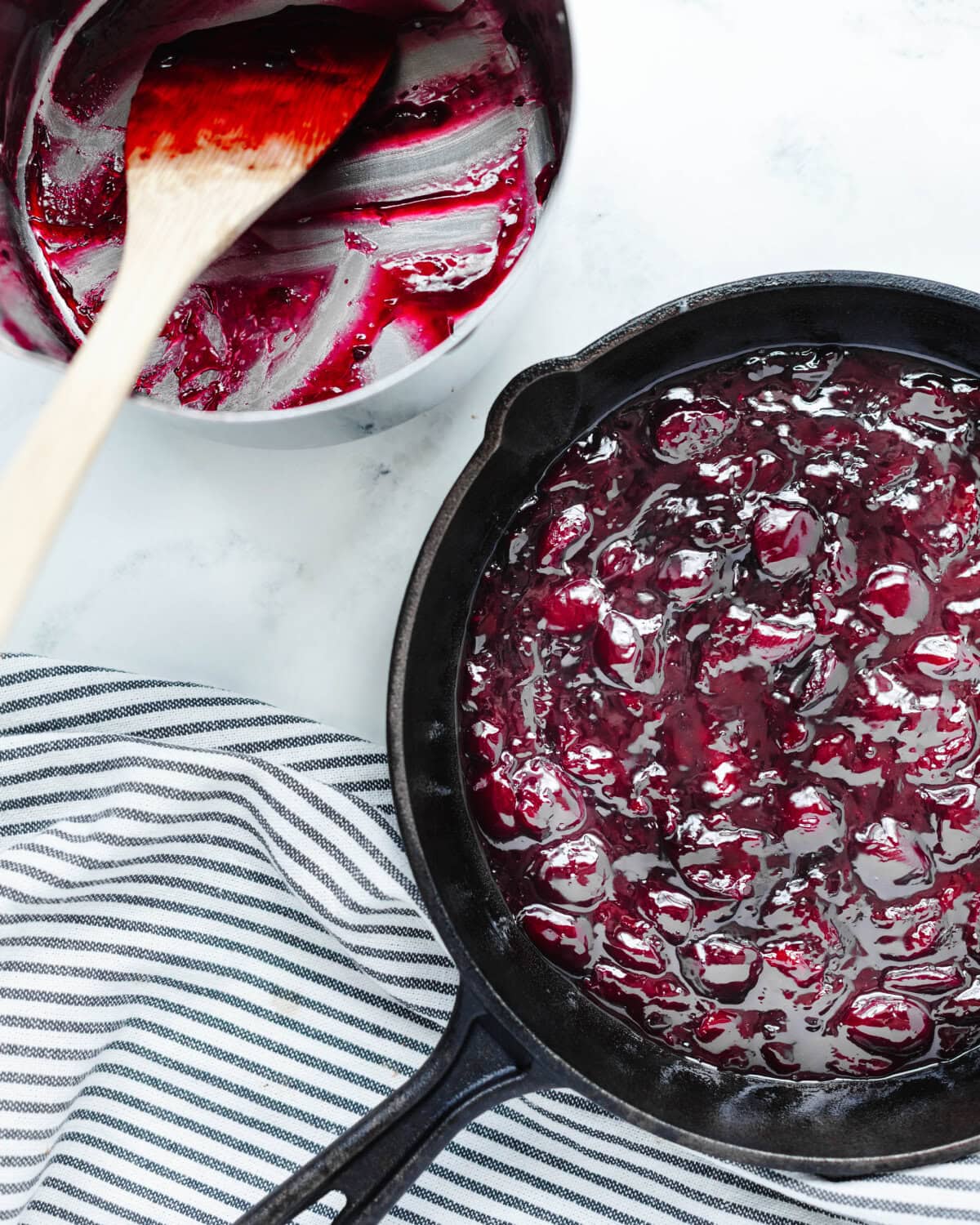 Cherries combined with sugar, cornstarch, and almond extract in a skillet.