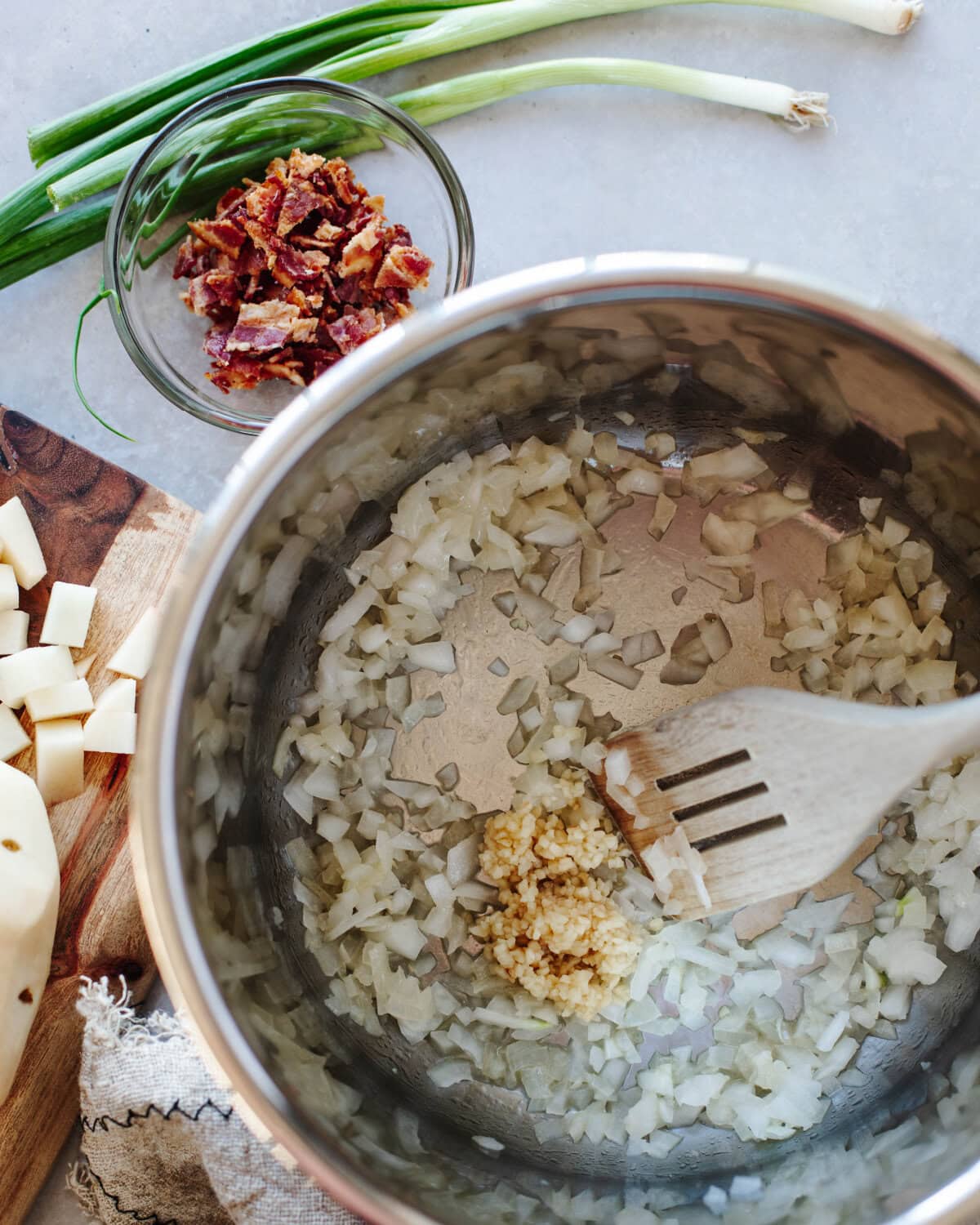 Onion and garlic cooking in an Instant Pot.