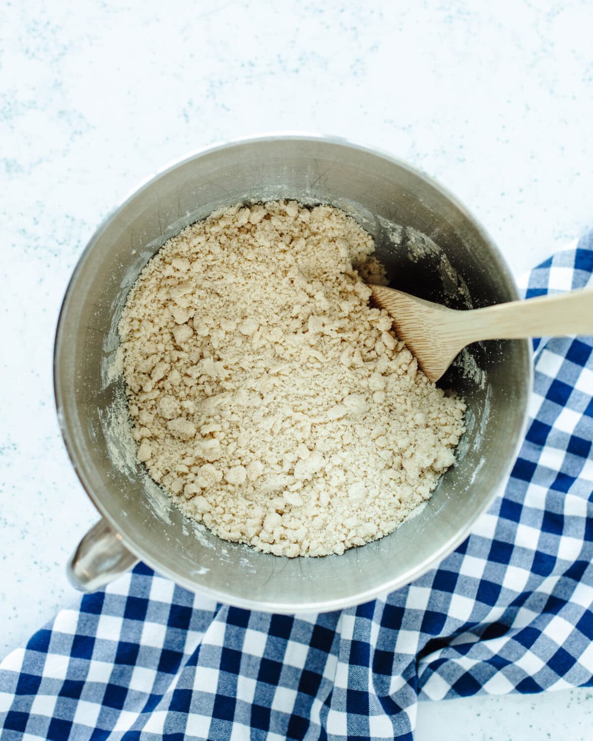 The sugar, butter, salt, eggs, and flour combined in a mixing bowl until incorporated.