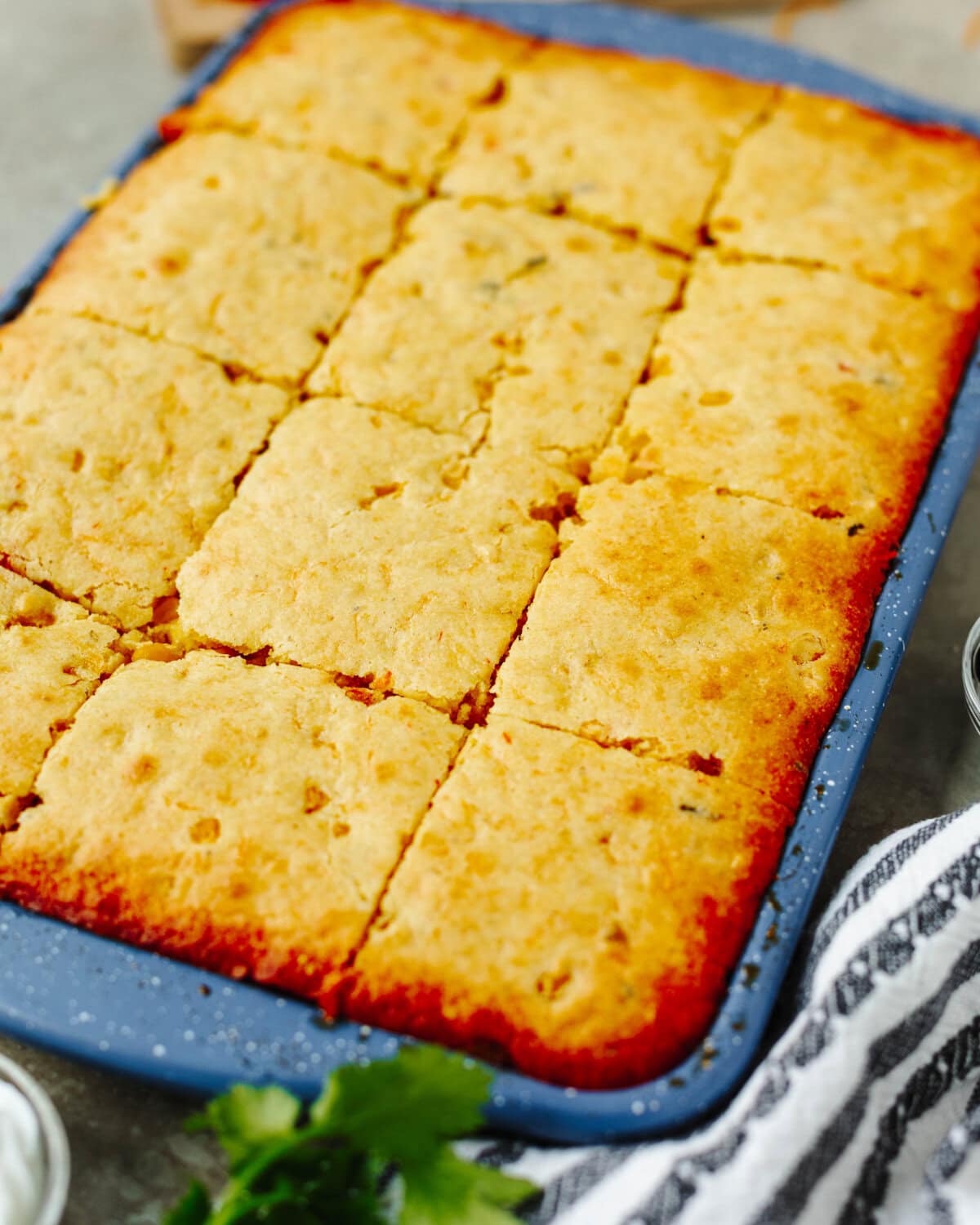 Taco cornbread casserole baked on a cookie sheet and ready to serve.
