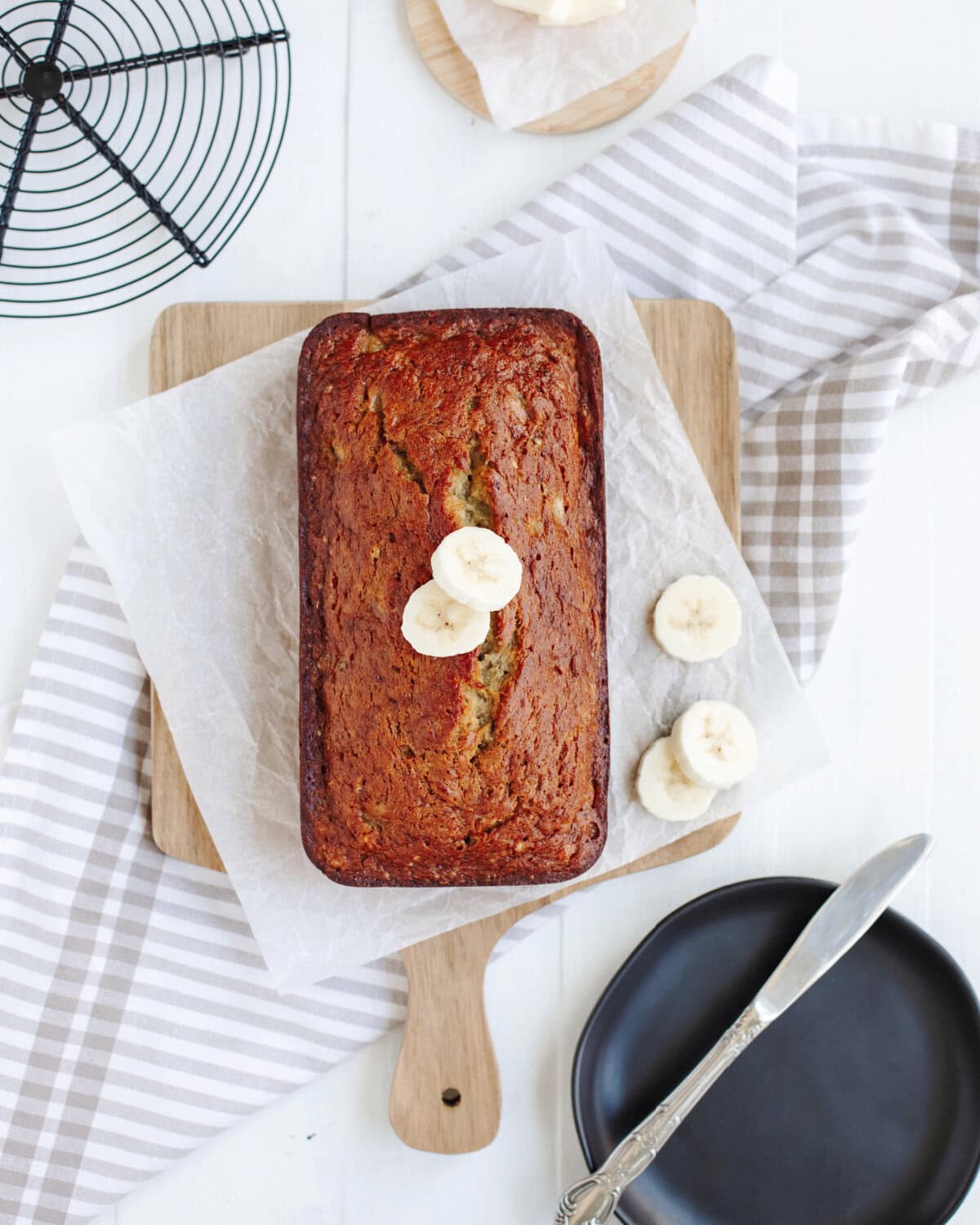 A top view of a loaf of bourbon banana bread from the oven.