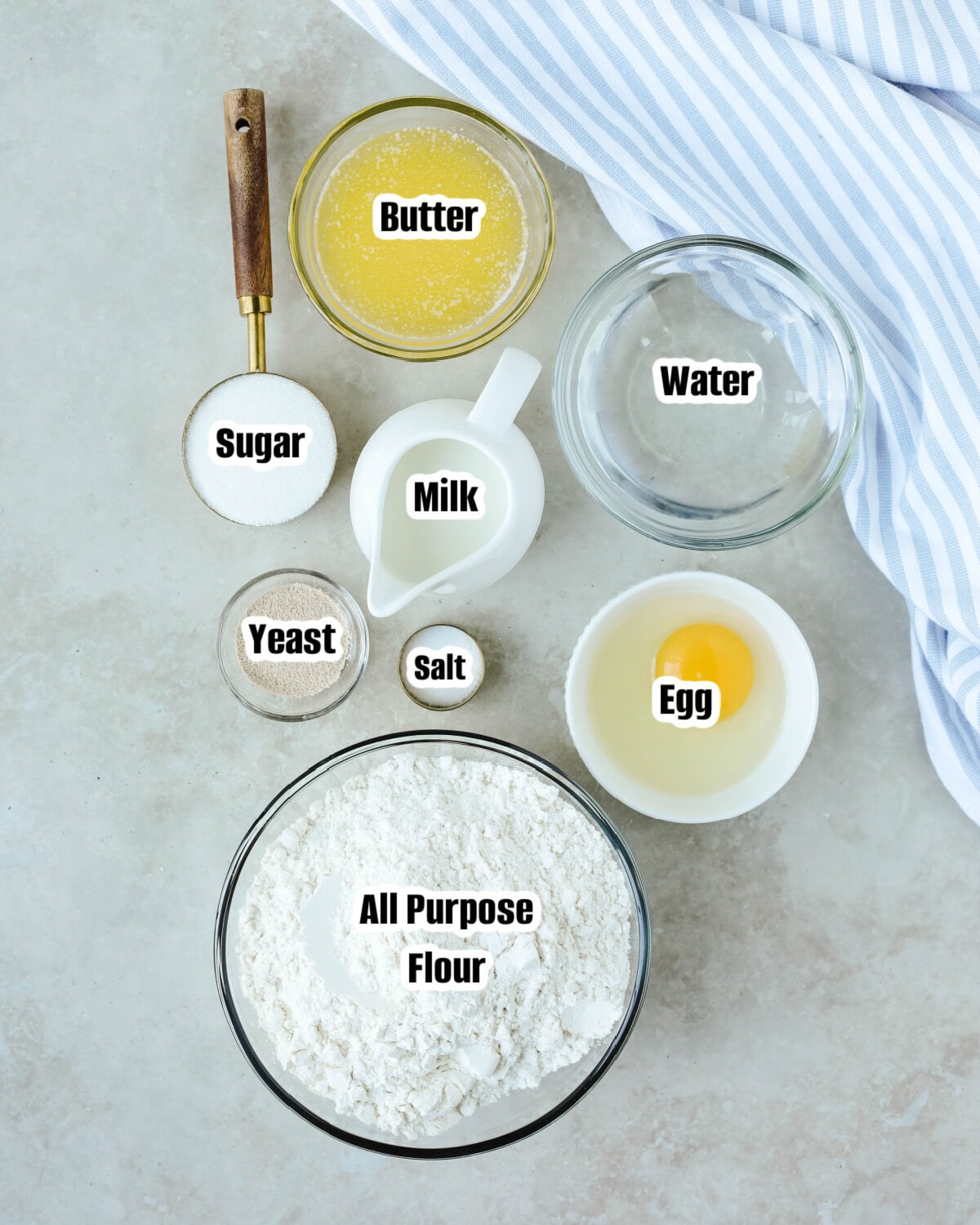All the ingredients needed to make Bread Machine Dinner Rolls.