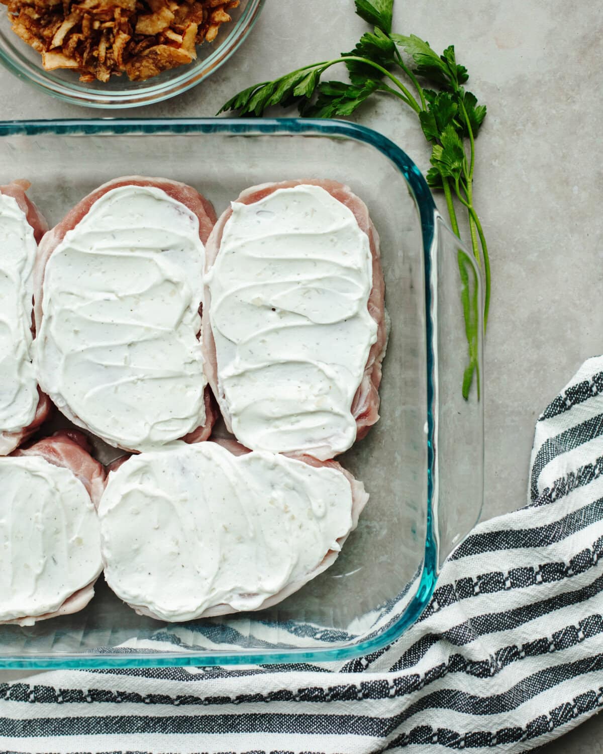 Boneless pork chops smothered with an onion dip.