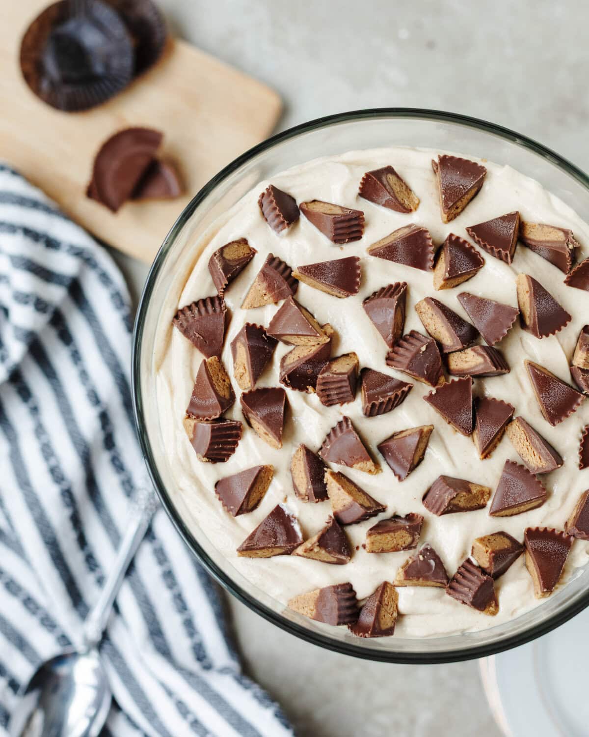 Peanut butter cups arranged on top of a peanut butter trifle.