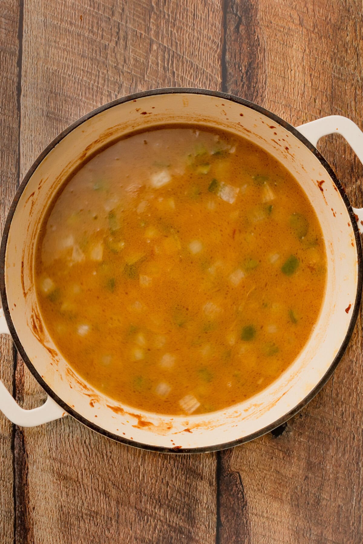 Hot water added to a roux in a Dutch oven.