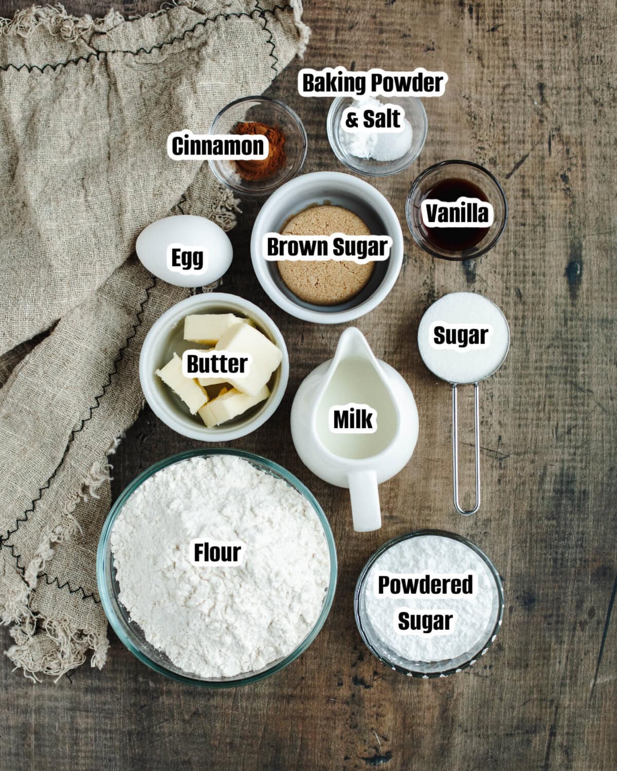 Flour, brown sugar, cinnamon, butter, milk, vanilla, and other ingredients for coffee cake donuts.