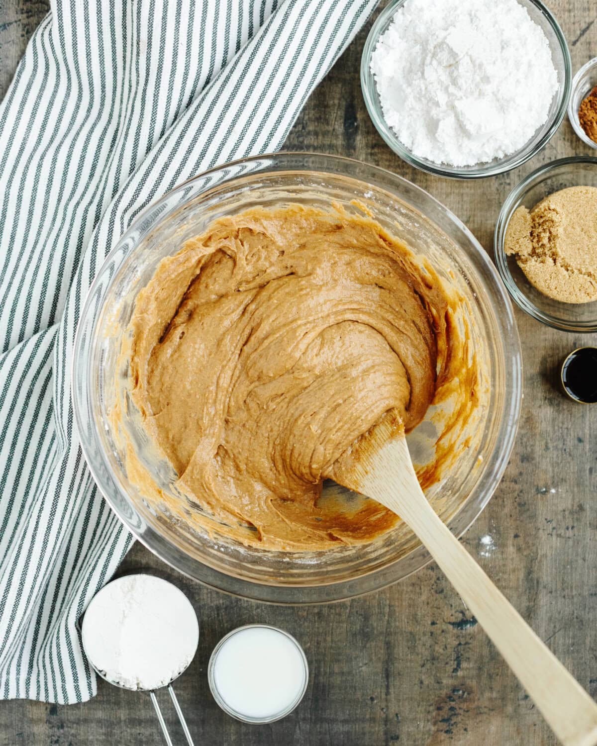 Pumpkin coffee cake batter prepared in a glass mixing bowl.