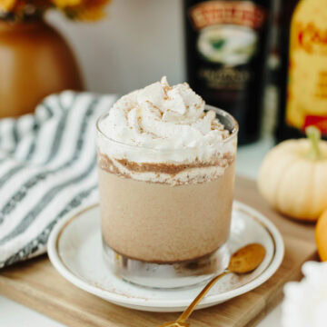 A pumpkin spice mudslide garnished with cinnamon and whipped cream ready to serve.