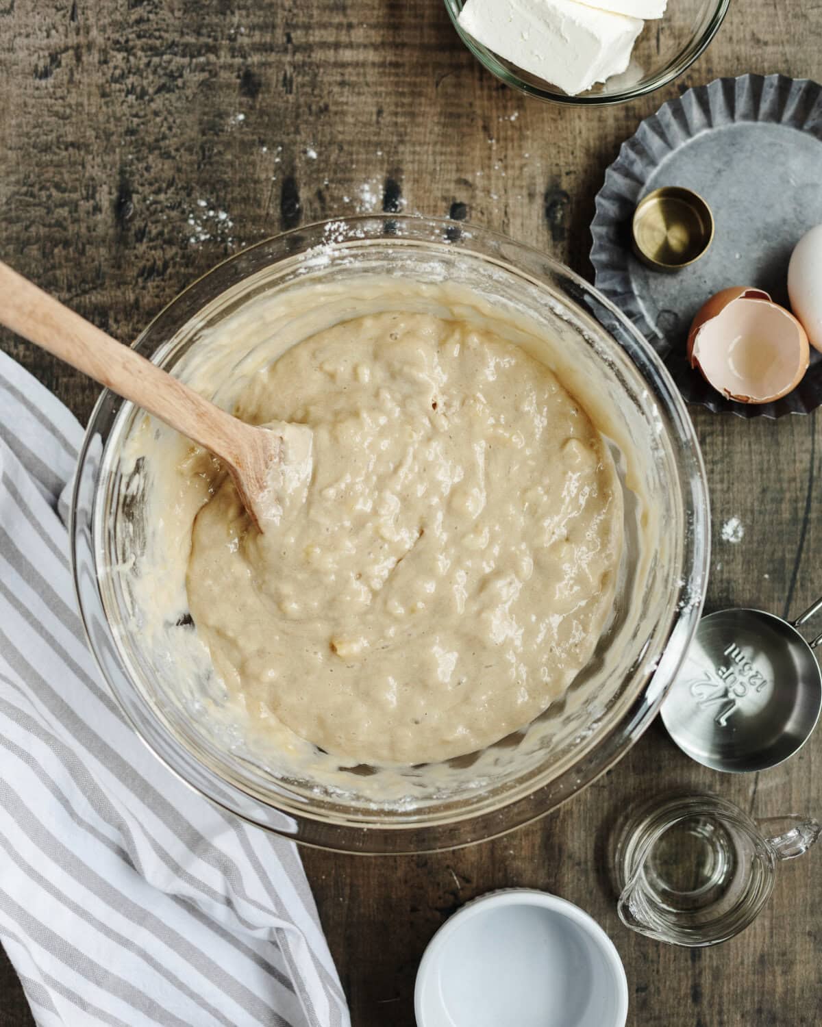 Whisked banana mixture into the flour mixture and stirred until just combined in a glass mixing bowl.