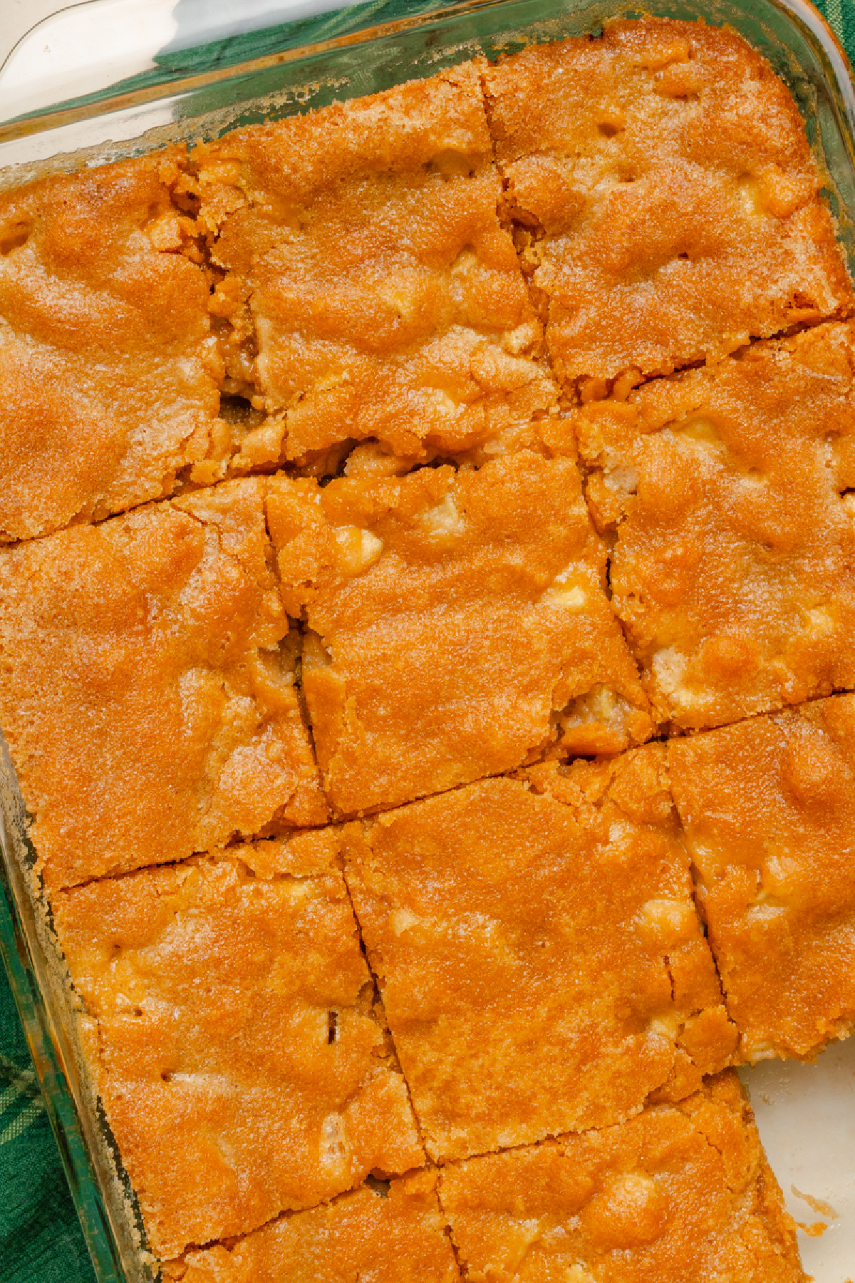 Fresh apple cake baked in a glass 9x13 baking pan.