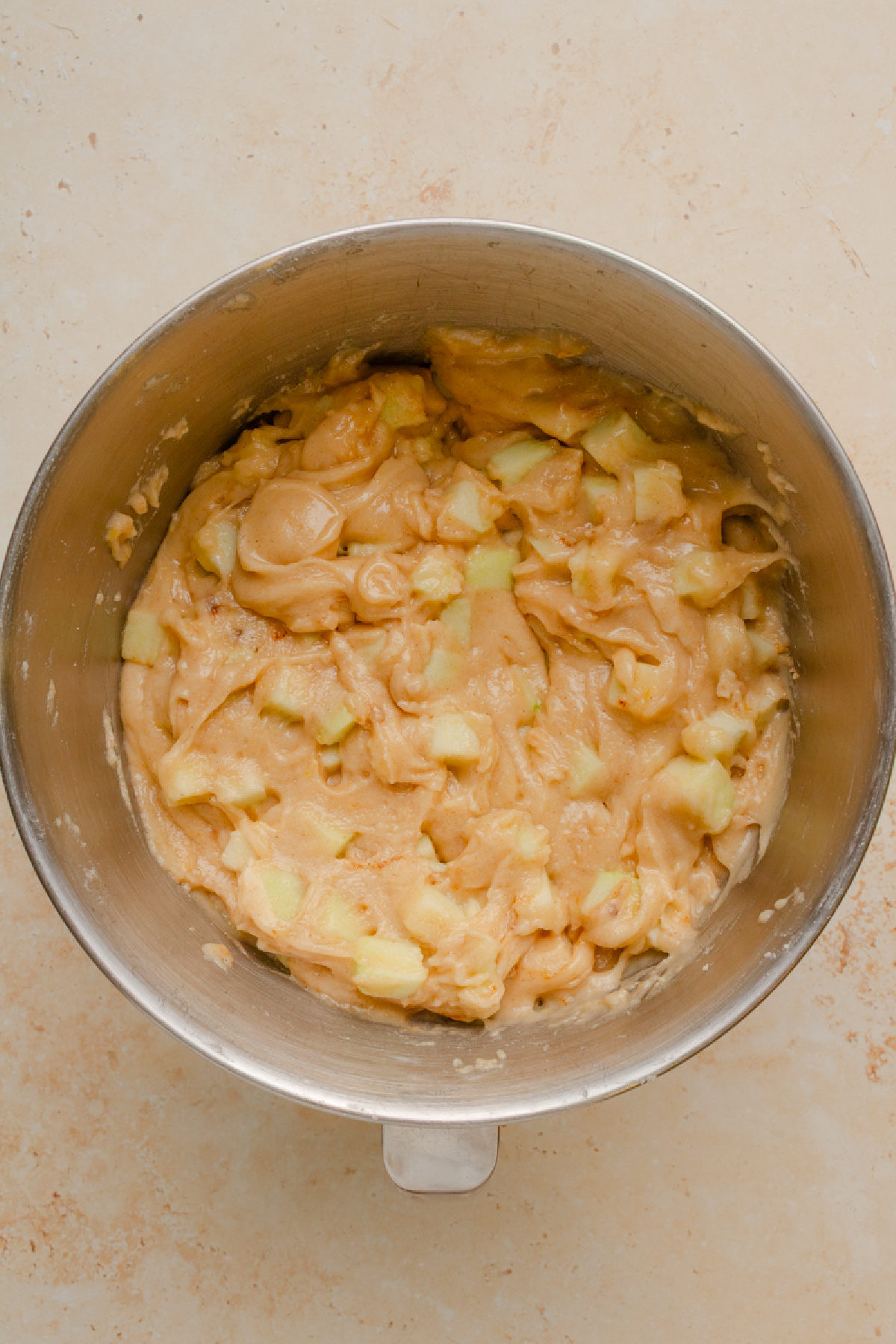 Cake batter combined in a mixing bowl.