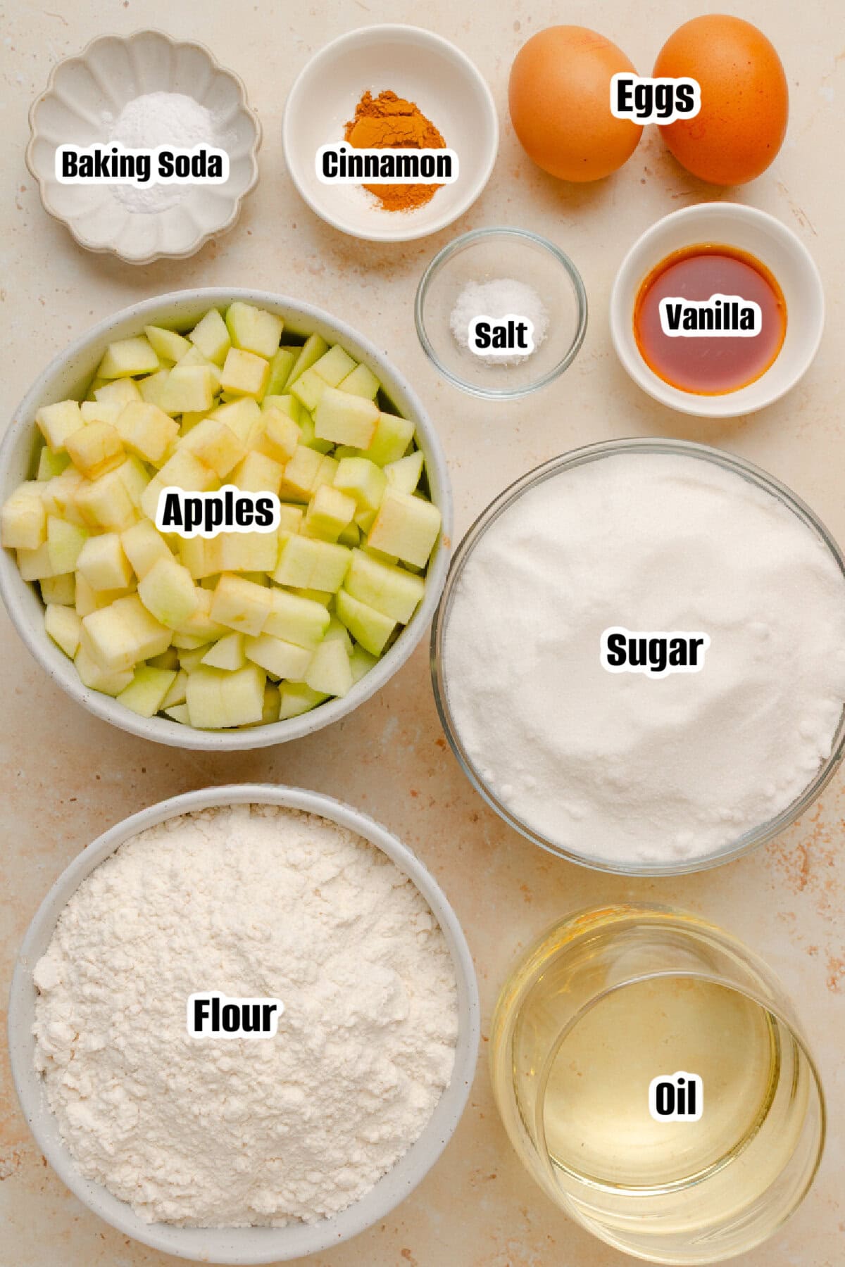 All the ingredients needed to make fresh apple cake.