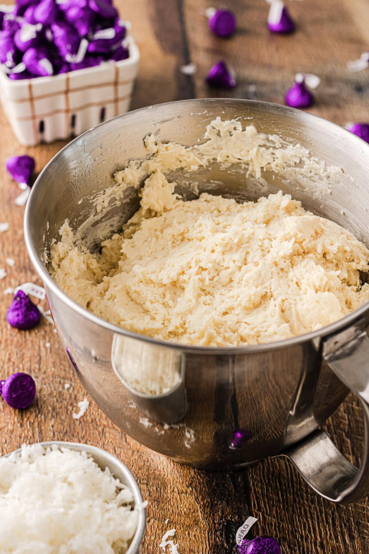 Butter, cream cheese, and sugar creamed together in a mixing bowl.