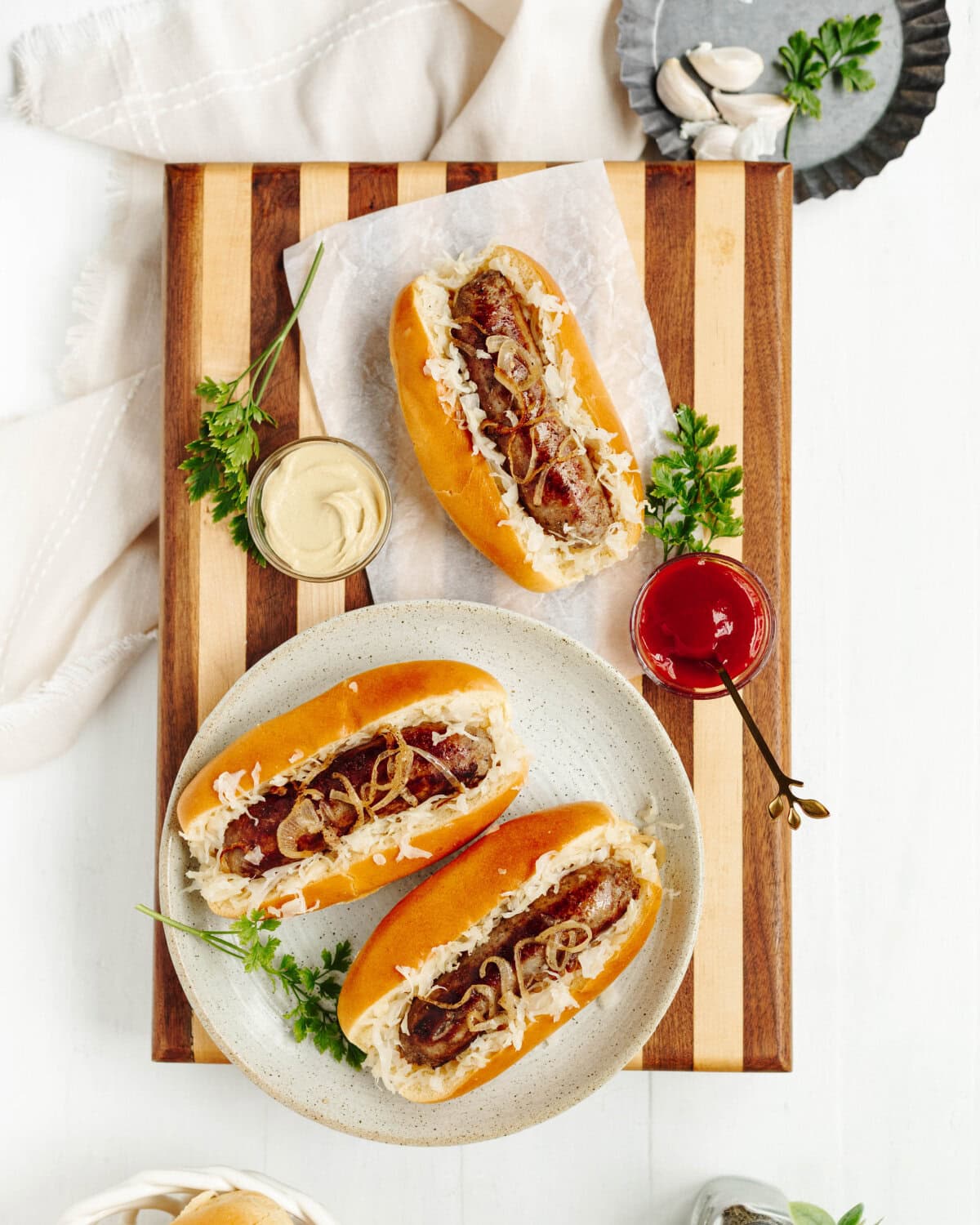 Plated sausage bratwursts on a plate ready to enjoy.